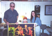 Kent, Bill, and Pegge with poster from "Cry Baby Killer"