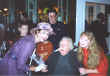 The Anderson family and Kim Mayo greet Bill in the Dining Room