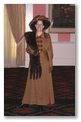 Pegge B. models a 1912 walking suit in the fashion show 